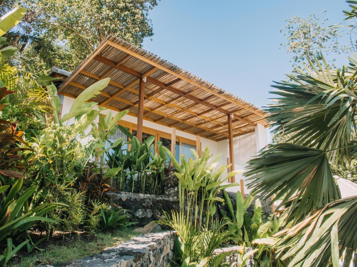 Neano Escape Hotel Manggis Екстериор снимка The house of the writer, architect and designer, in the garden of his home in the village of Khao Sam Roi Yot, Thailand