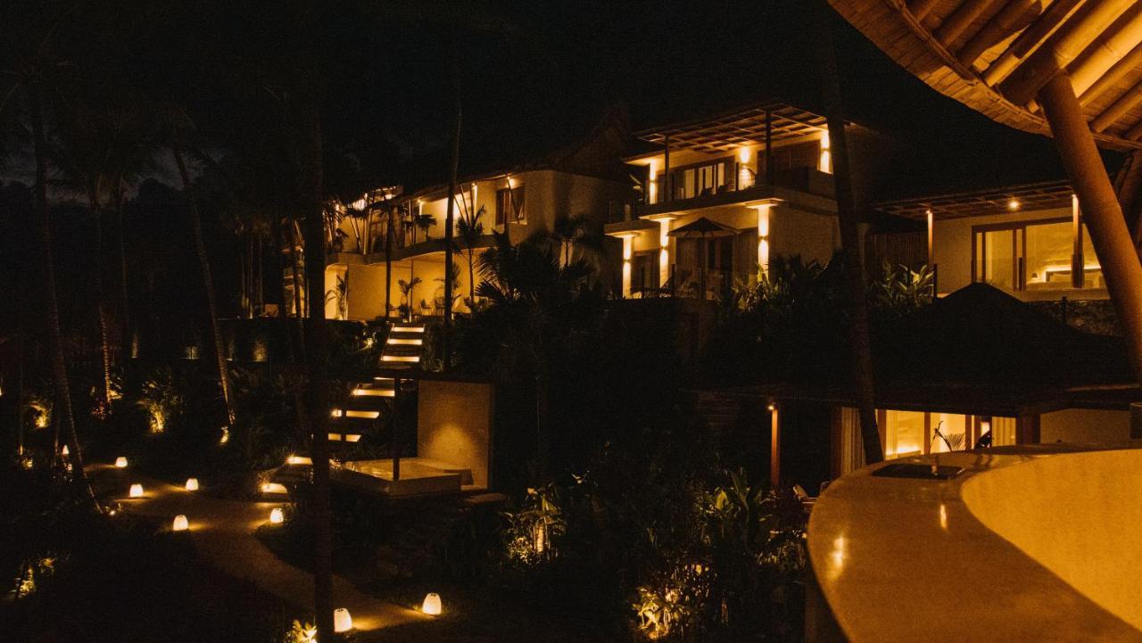Neano Escape Hotel Manggis Екстериор снимка The resort at night